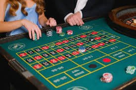 Slot game selection screen showing Aviator and Fortune Tiger tiles